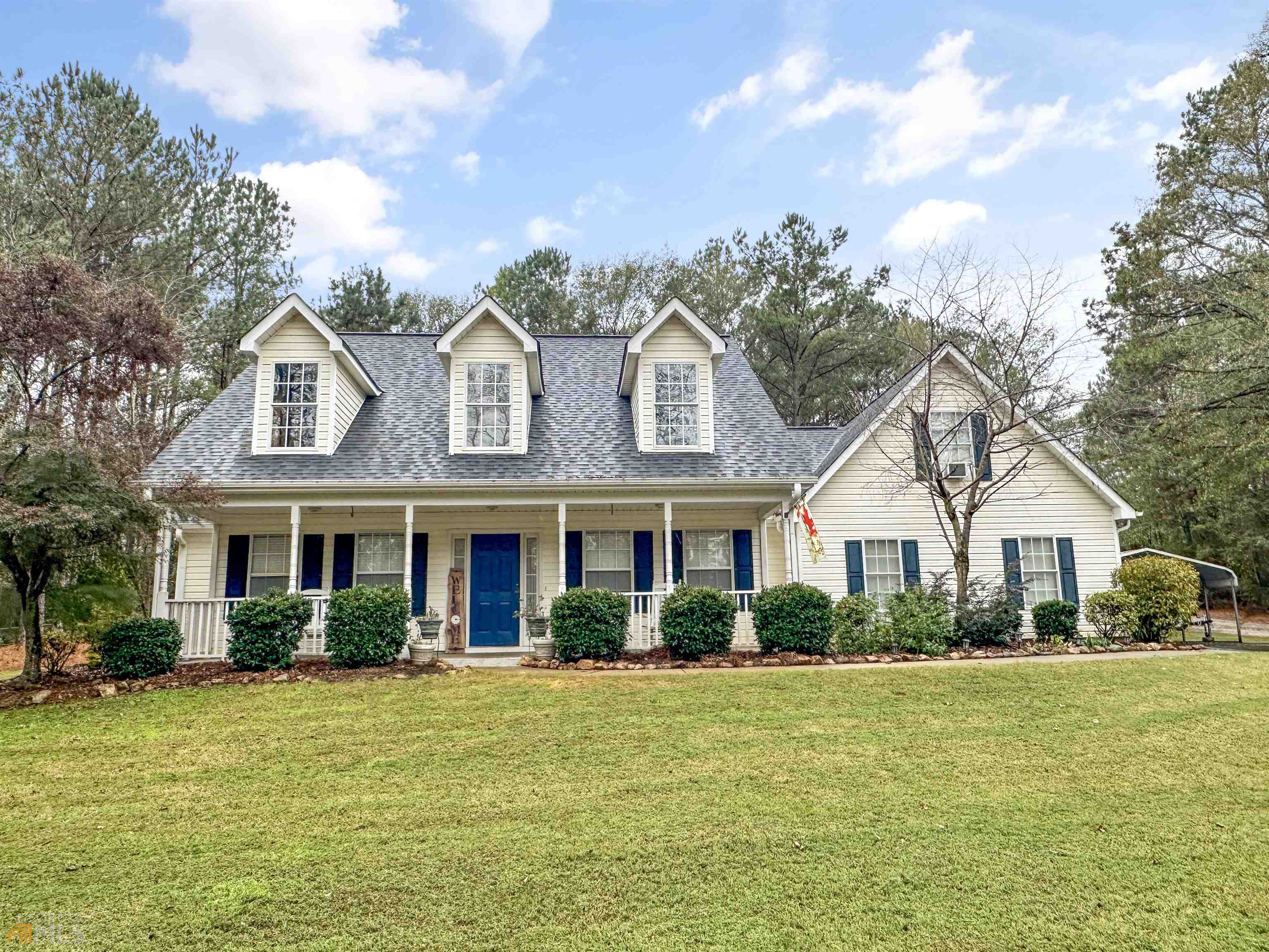 176 Evans Road Jackson, GA 30233 - Photo 1 of 1 a front view of house with yard and green space