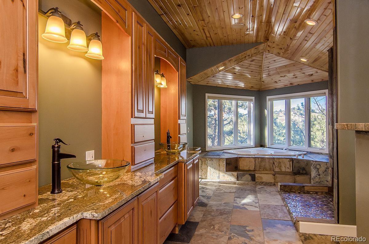 955 Castle Ridge Road Golden, CO 80401 - Photo 11 of 27 a room with large window