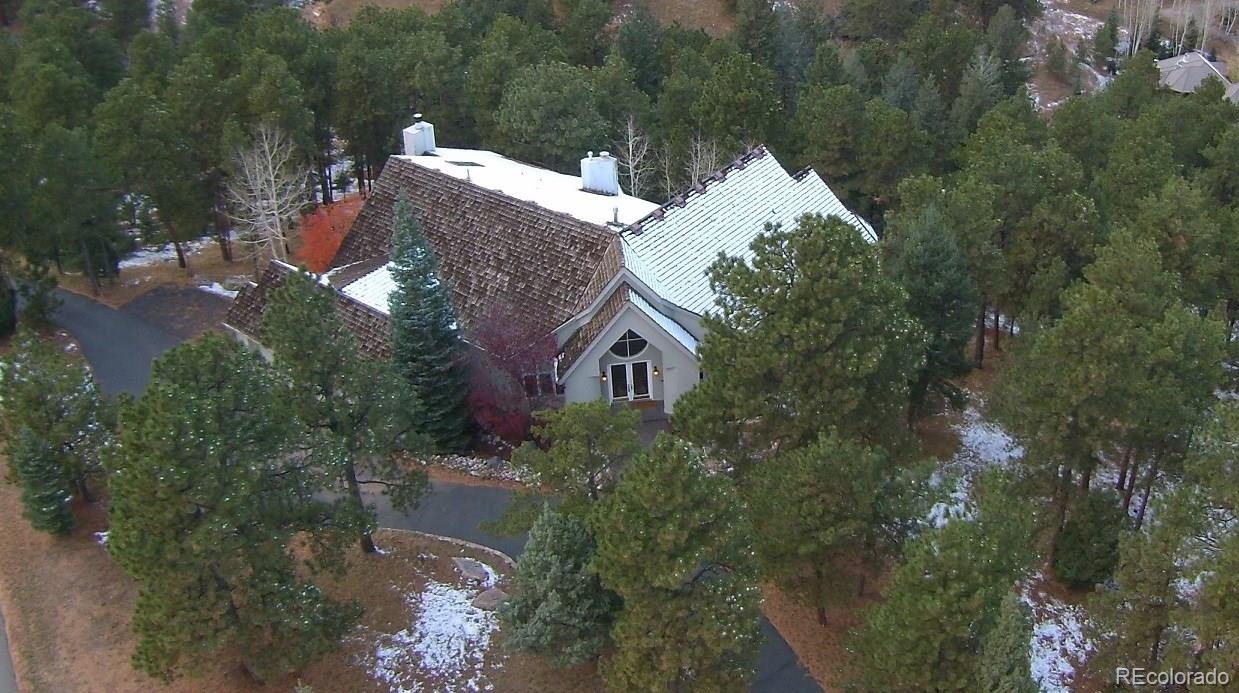955 Castle Ridge Road Golden, CO 80401 - Photo 23 of 27 an aerial view of a house