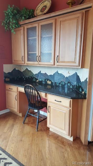 955 Castle Ridge Road Golden, CO 80401 - Photo 9 of 27 a view of a chair and table in the house