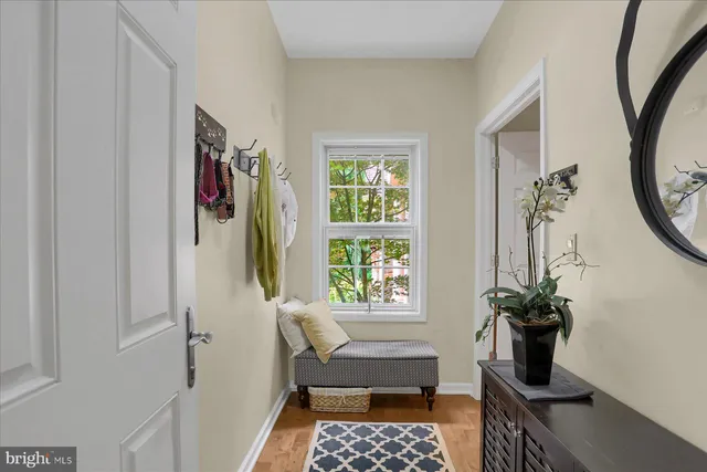 a bathroom with a sink vanity and mirror