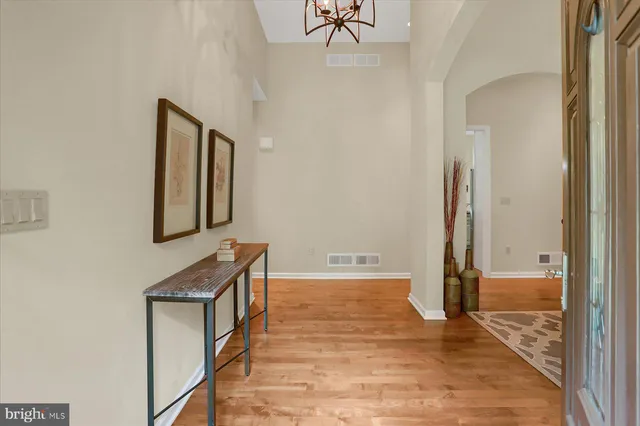 a bathroom with a bathtub and window