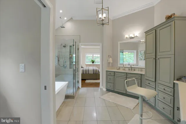 a bathroom with a sink vanity and a mirror