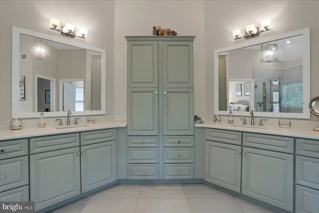 a bedroom with furniture and a book shelf