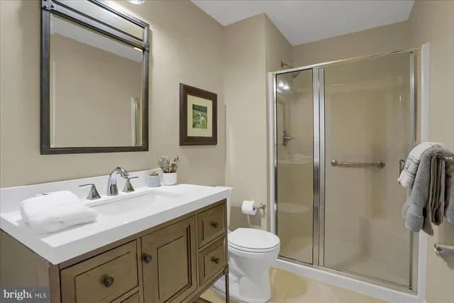 a bathroom with a sink a vanity and a mirror