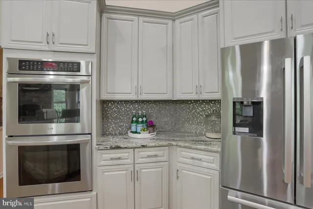 a view of living room with furniture and window