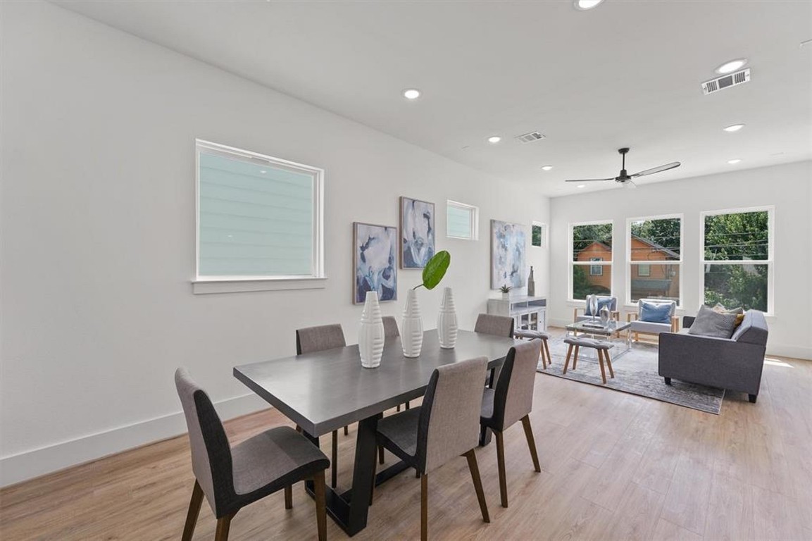 1207 Cavalcade Street, Unit B Houston, TX 77009 - Photo 7 of 20 a view of a dining room with furniture and wooden floor