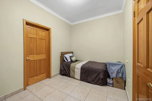 a bed room with a bed and a dresser