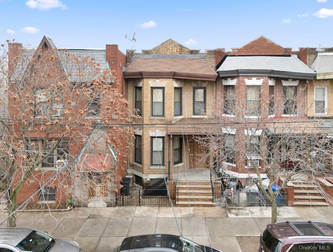 20-15 Menahan Street Queens, NY 11385 - Photo 2 of 41 a front view of a house with a yard