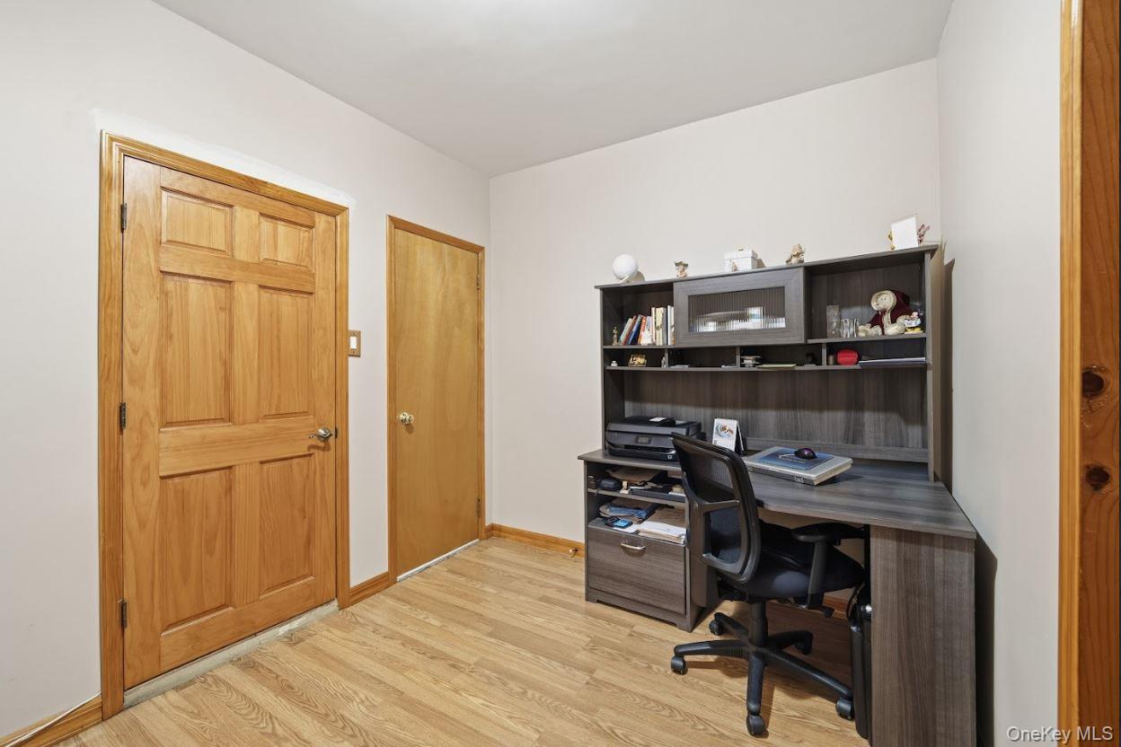 20-15 Menahan Street Queens, NY 11385 - Photo 29 of 41 a view of a workspace with furniture