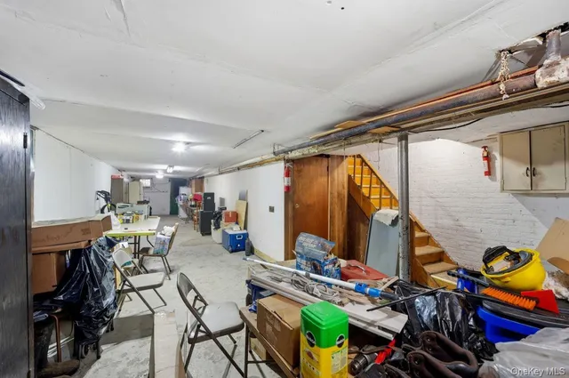 a view of an empty room with stairs
