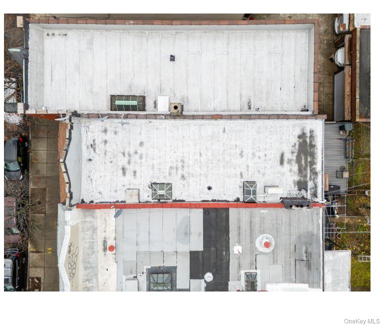 20-15 Menahan Street Queens, NY 11385 - Photo 39 of 41 a bathroom with a sink and a mirror