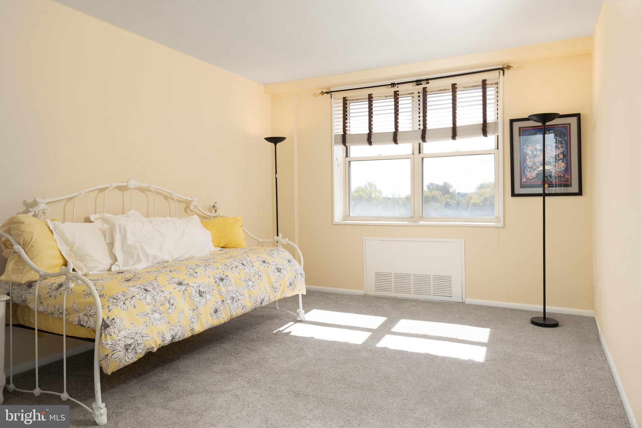 20 Conshohocken State Road, Unit 611 Bala Cynwyd, PA 19004 - Photo 15 of 25 a bedroom with a bed and window