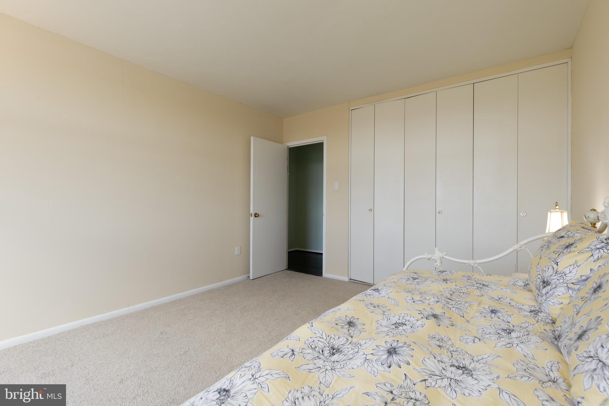 20 Conshohocken State Road, Unit 611 Bala Cynwyd, PA 19004 - Photo 16 of 25 a bedroom with a bed and a window