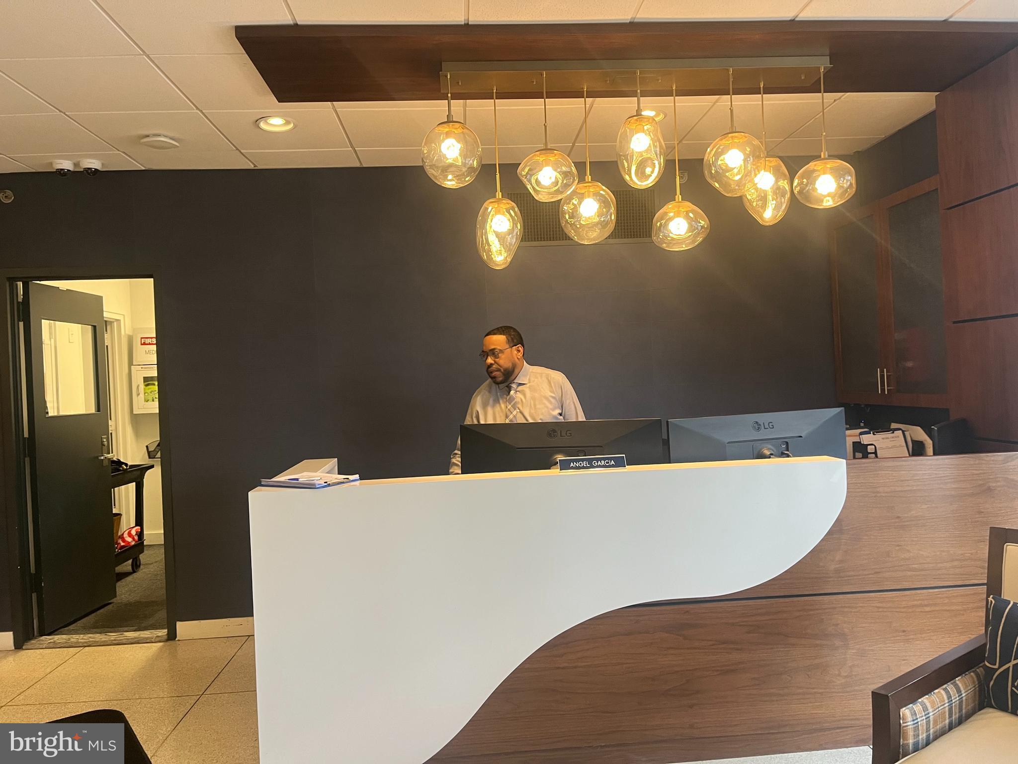 20 Conshohocken State Road, Unit 611 Bala Cynwyd, PA 19004 - Photo 22 of 25 a bed sitting in a bathroom and chandelier