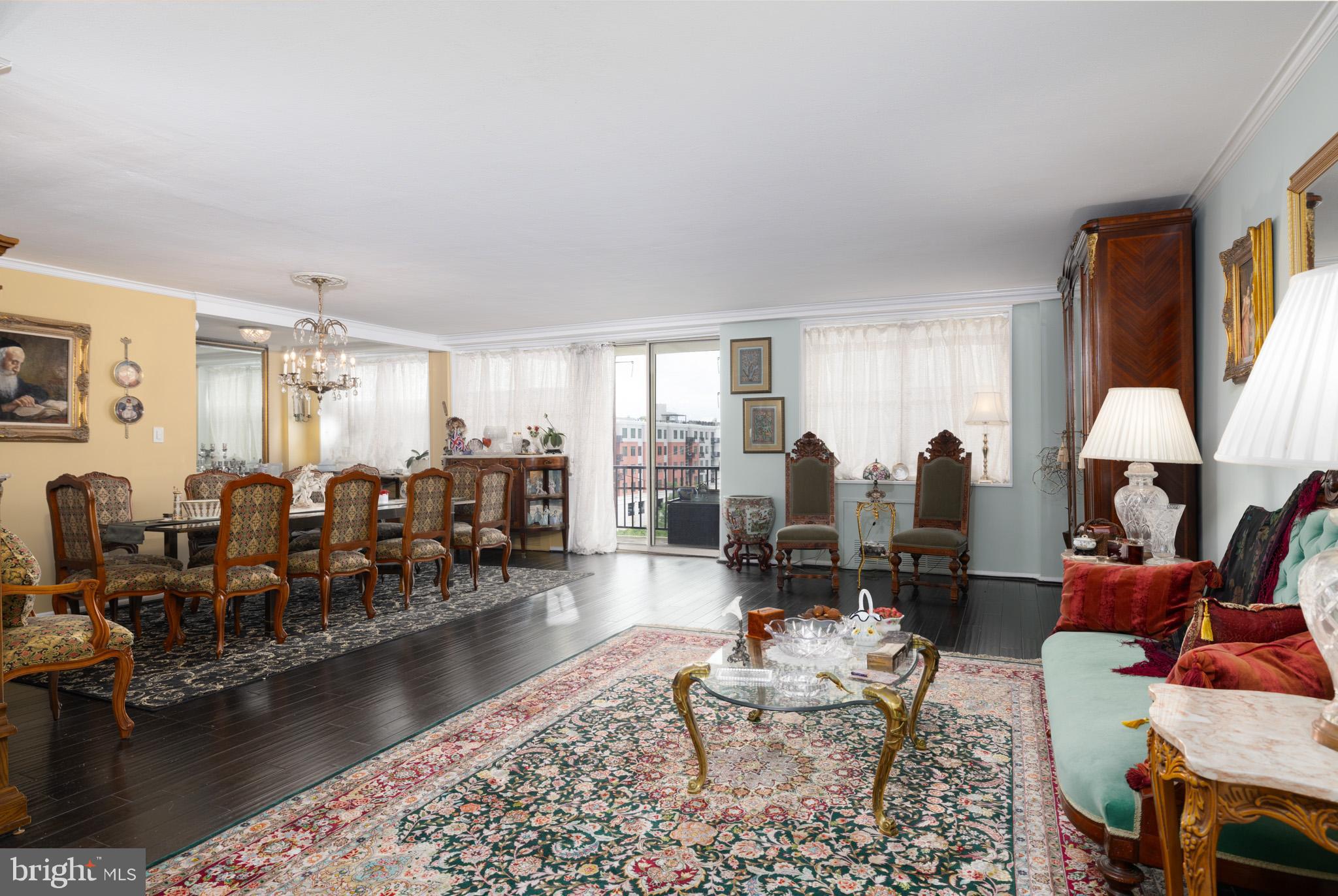 20 Conshohocken State Road, Unit 611 Bala Cynwyd, PA 19004 - Photo 3 of 25 a living room with fireplace furniture and a large window