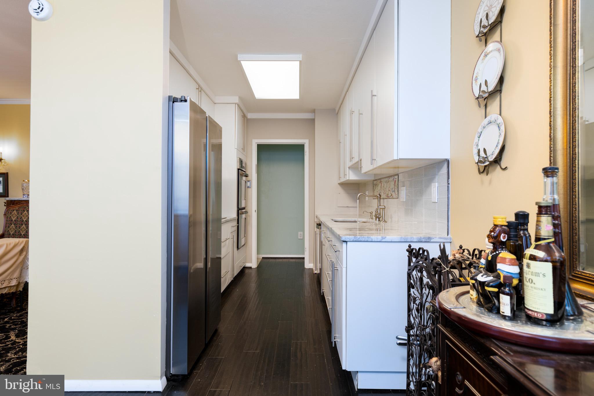 20 Conshohocken State Road, Unit 611 Bala Cynwyd, PA 19004 - Photo 6 of 25 a view of a dining room with furniture and wooden floor
