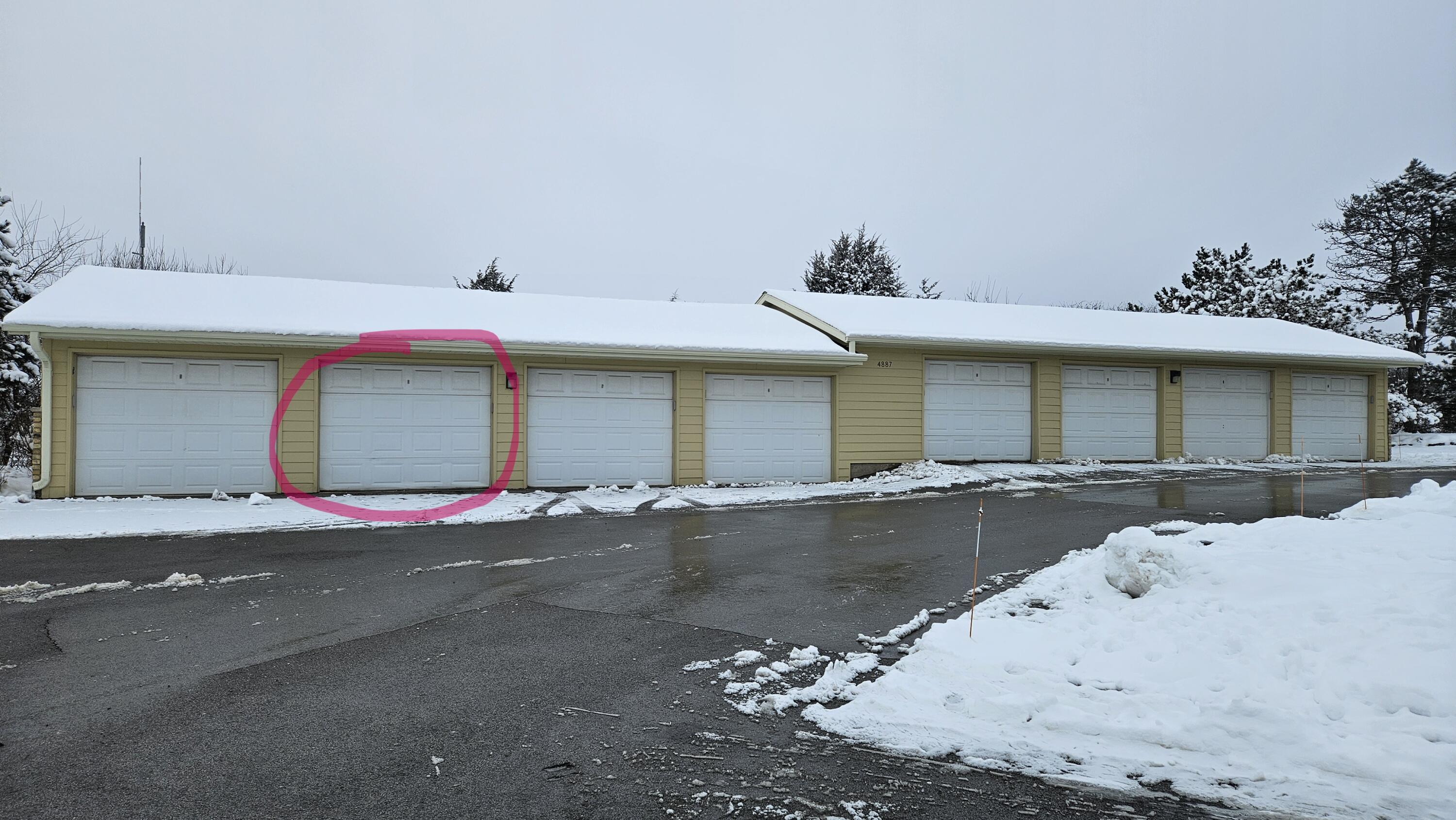 4887 Easy Street, Unit 11 Delafield, WI 53029 - Photo 24 of 26 1- car garage included across from building.