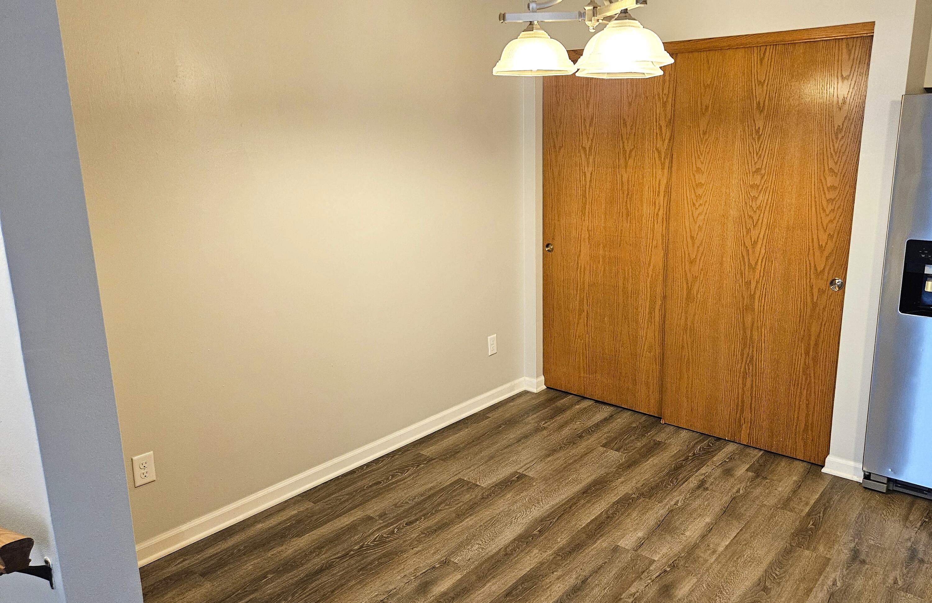 4887 Easy Street, Unit 11 Delafield, WI 53029 - Photo 7 of 26 Eat-in area in kitchen. Pantry closet as well.