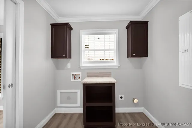 a bathroom with a sink and a window