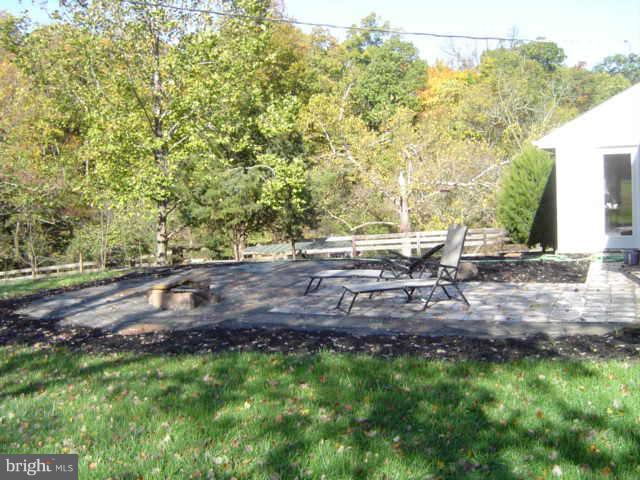 24335 Evergreen Mills Road Aldie, VA 20105 - Photo 3 of 5 a view of outdoor space with deck and yard