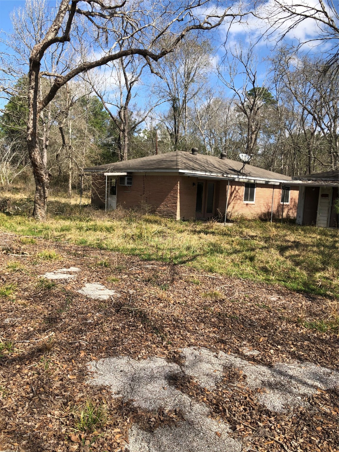 13284 Calhoun Road Conroe, TX 77302 - Photo 14 of 16 a view of a house with a yard
