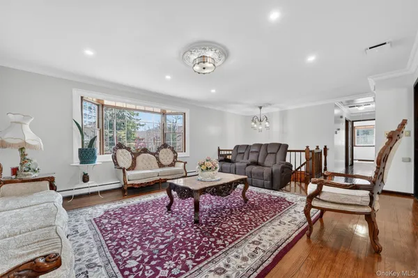 a living room with furniture and a table