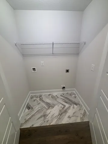 a view of a room with rack on the wall