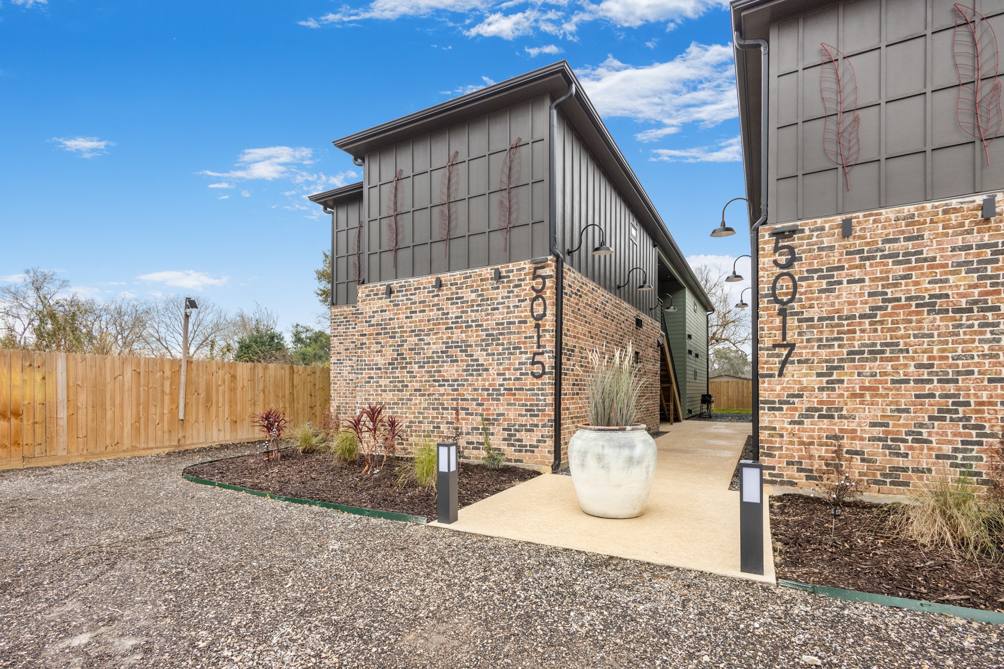 5015 Reed Road Houston, TX 77033 - Photo 5 of 13 a view of a building with a outdoor space