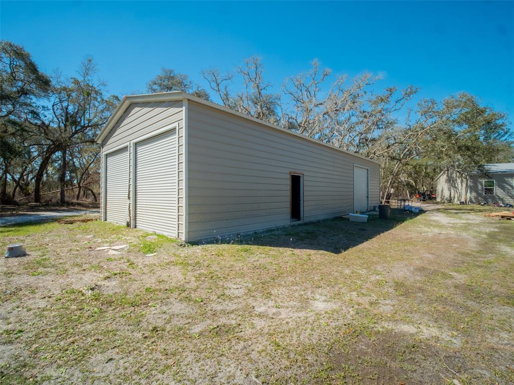 3949 184th Street Wellborn, FL 32094 - Photo 12 of 35 a view of garage and yard