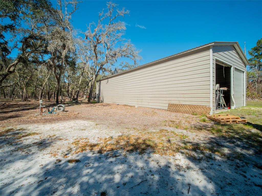 3949 184th Street Wellborn, FL 32094 - Photo 15 of 35 a view of outdoor space with trees