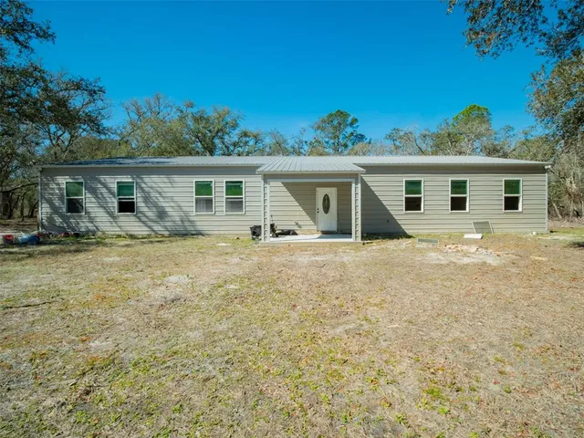 front view of house with a yard
