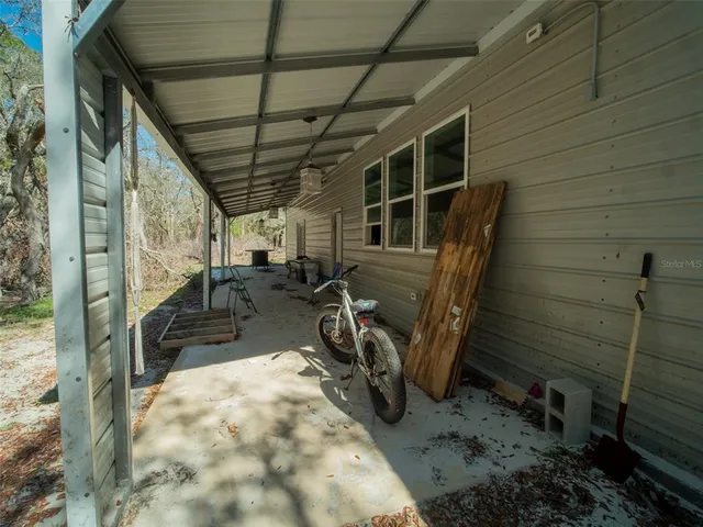 a view of a porch with furniture