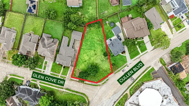 an aerial view of a house with outdoor space