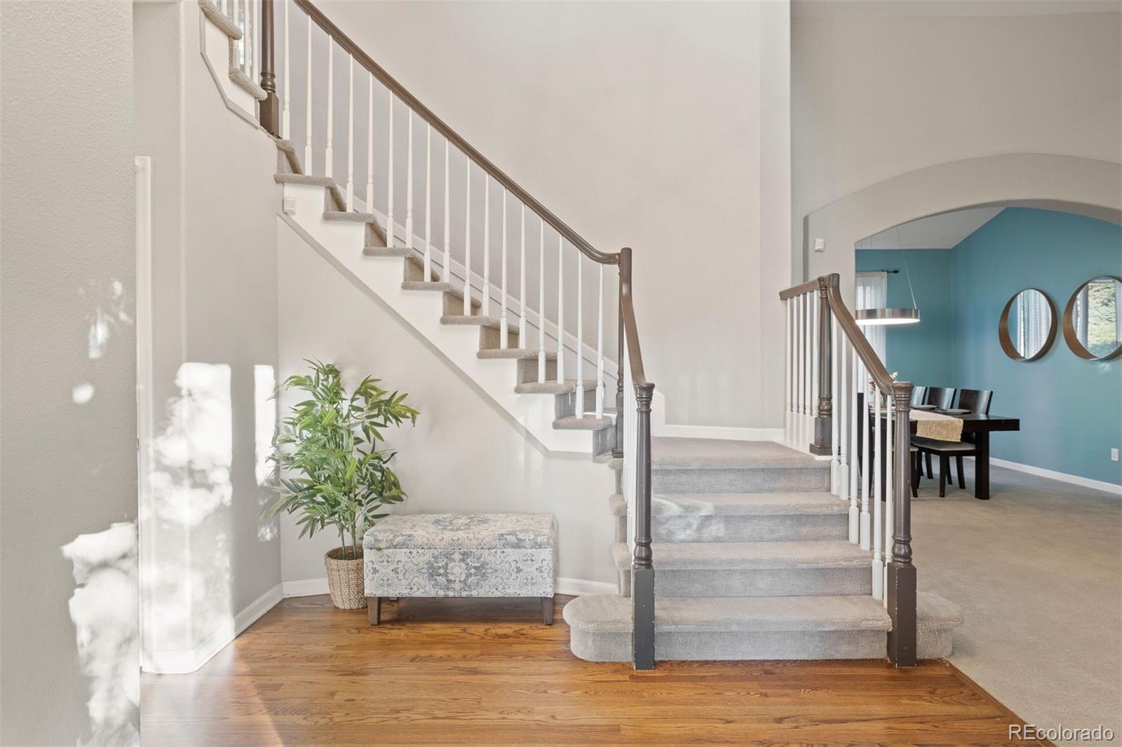 5426 East Knoll Place Highlands Ranch, CO 80130 - Photo 3 of 28 a view of entryway and hall with wooden floor