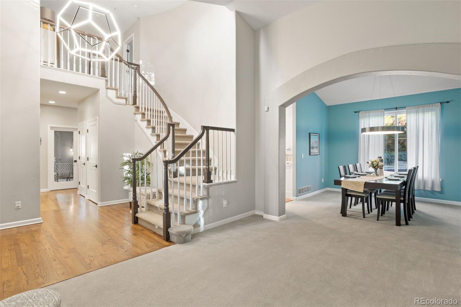 5426 East Knoll Place Highlands Ranch, CO 80130 - Photo 4 of 28 a view of a livingroom with furniture and stairs