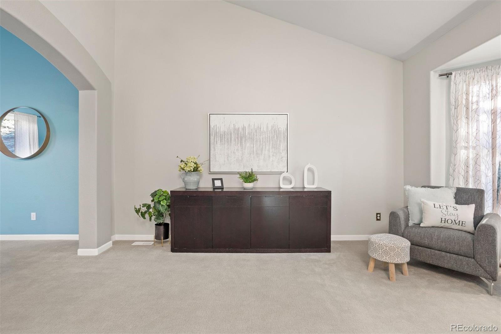 5426 East Knoll Place Highlands Ranch, CO 80130 - Photo 5 of 28 a living room with furniture