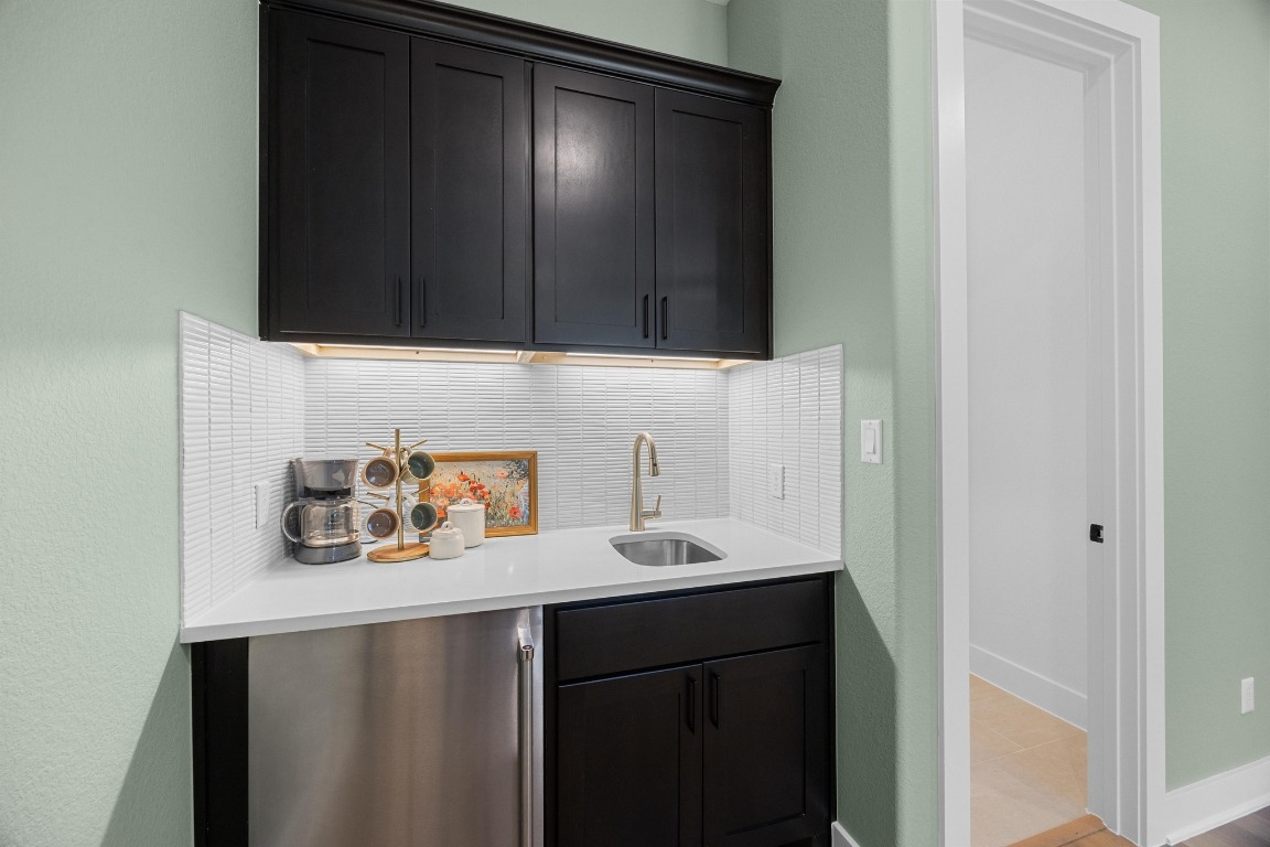 815 Flint Ridge Trail Georgetown, TX 78628 - Photo 27 of 39 a bathroom with a sink and a mirror