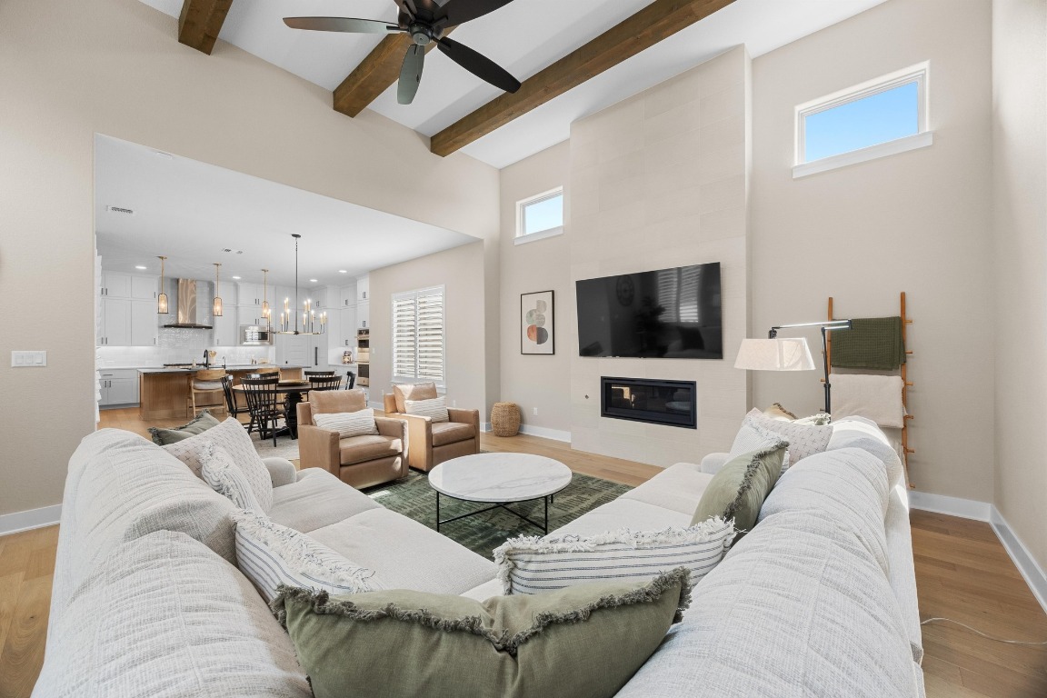 815 Flint Ridge Trail Georgetown, TX 78628 - Photo 3 of 39 a living room with furniture and a flat screen tv
