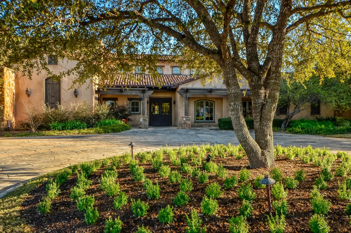 815 Flint Ridge Trail Georgetown, TX 78628 - Photo 35 of 39 a front view of a house with garden