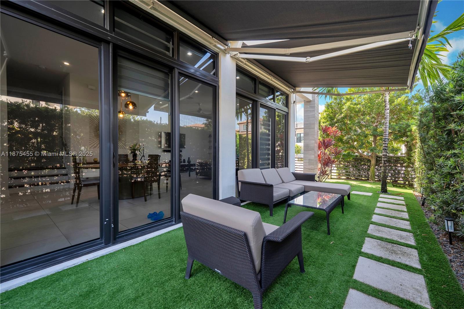 8279 Northwest 43rd Street Doral, FL 33166 - Photo 31 of 56 Side patio.