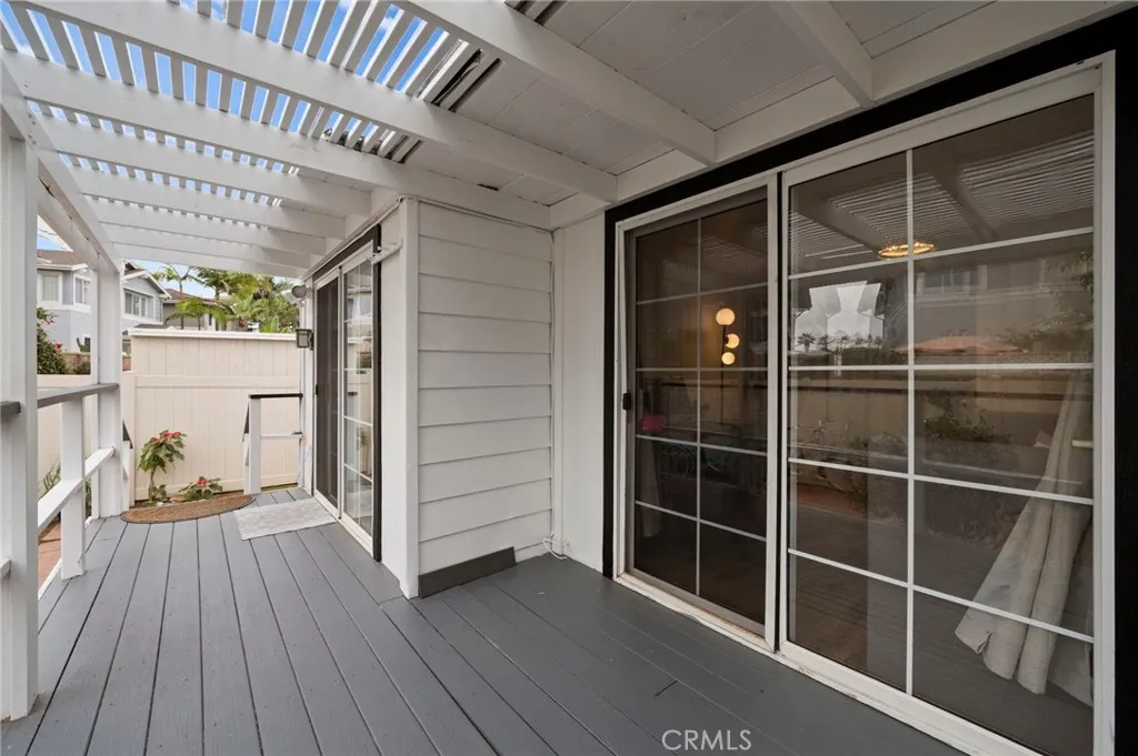 6550 Ponto, Unit 17 Carlsbad, CA 92011 - Photo 29 of 48 a view of outdoor space with wooden floor and windows