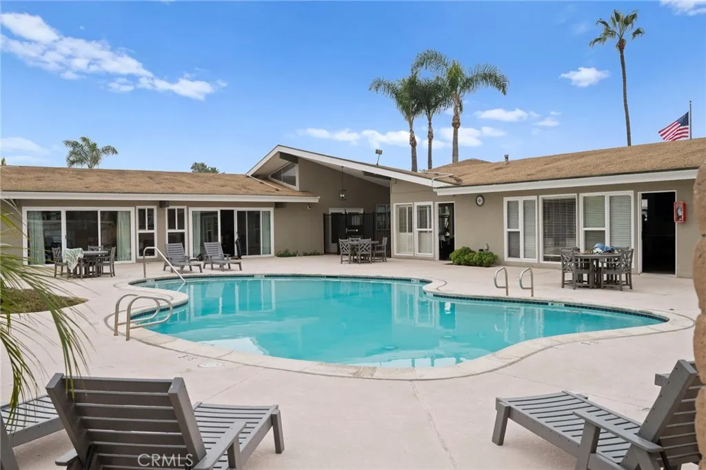 6550 Ponto, Unit 17 Carlsbad, CA 92011 - Photo 44 of 48 a view of a house with swimming pool and sitting area