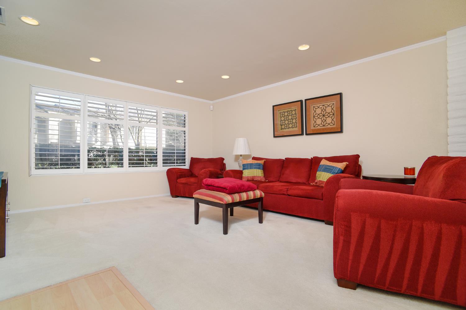 151 Hartnell Place Sacramento, CA 95825 - Photo 9 of 35 a living room with furniture a table and a large window