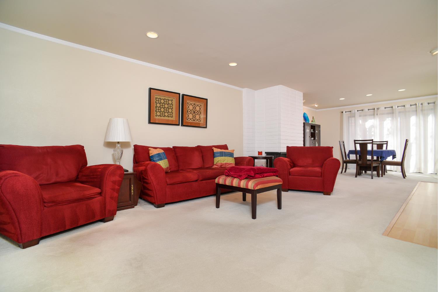 151 Hartnell Place Sacramento, CA 95825 - Photo 10 of 35 a living room with furniture a table and a flat screen tv
