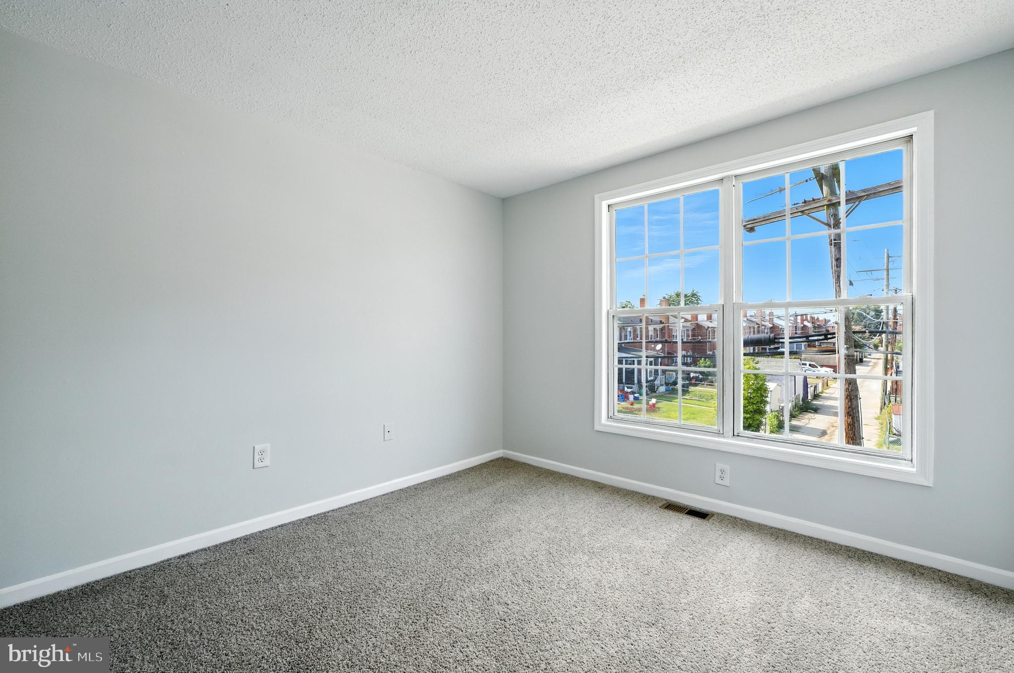 209 Magnolia Terrace Baltimore, MD 21221 - Photo 14 of 50 an empty room with a window