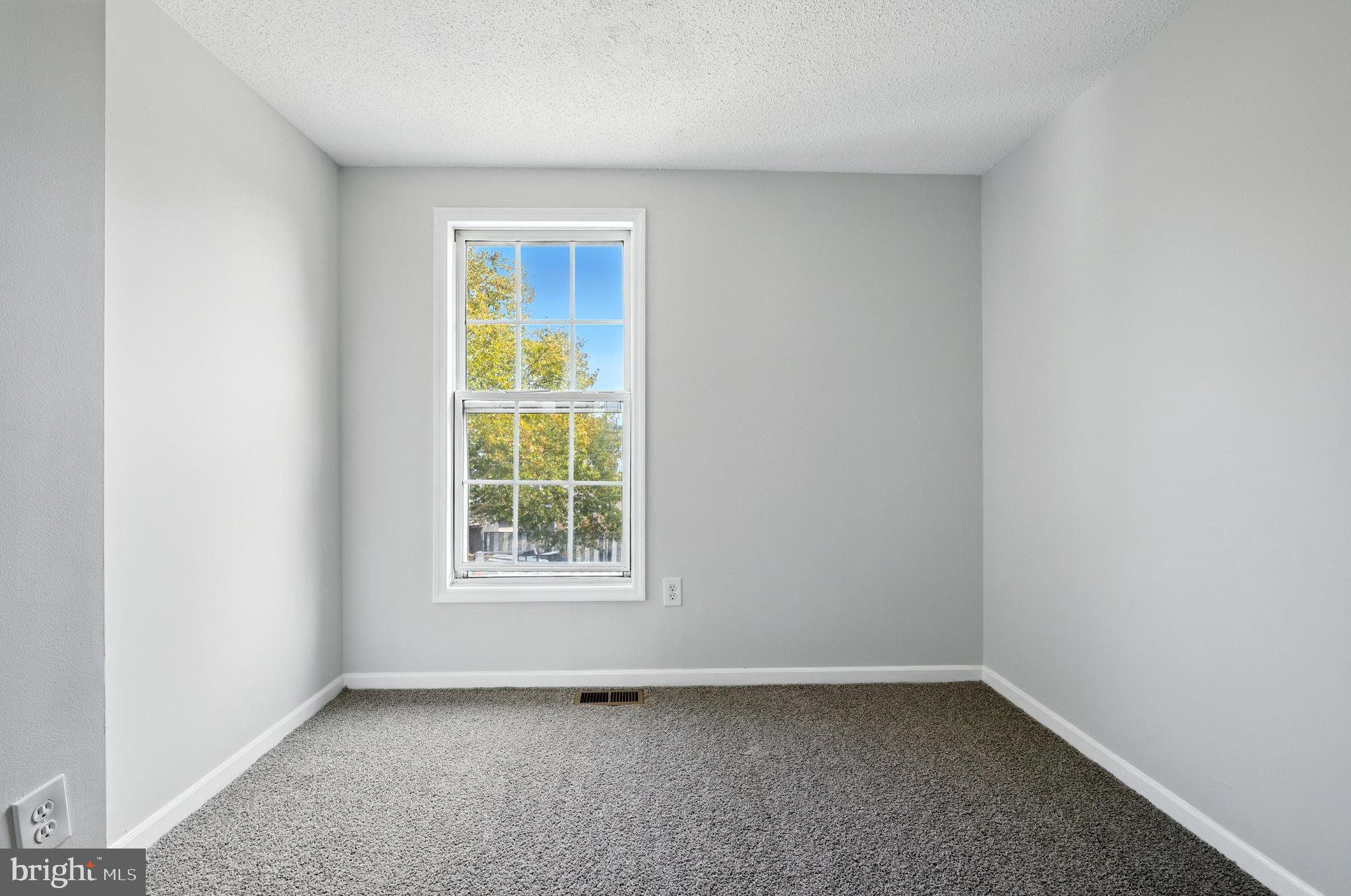 209 Magnolia Terrace Baltimore, MD 21221 - Photo 18 of 50 an empty room with a window
