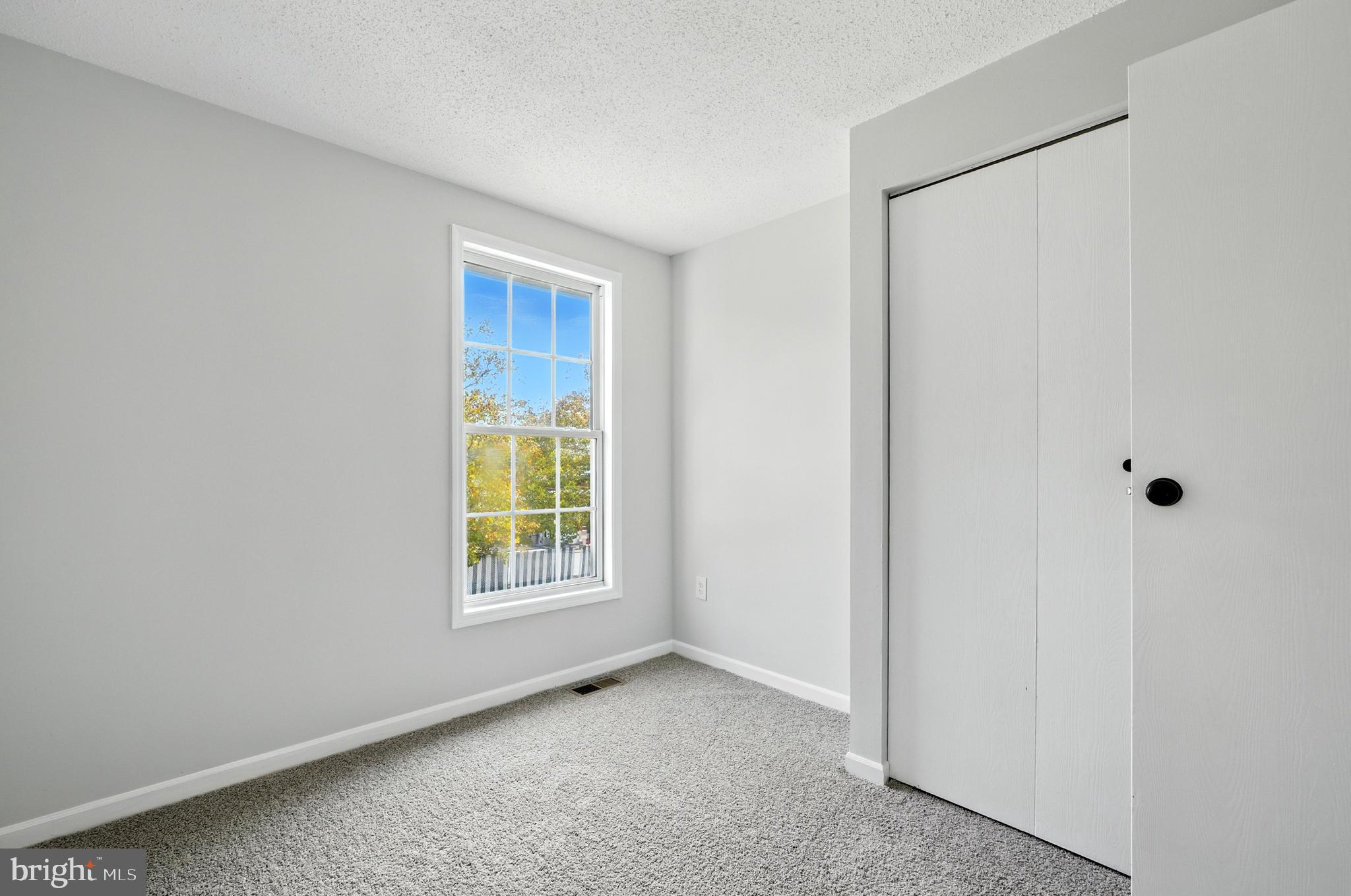 209 Magnolia Terrace Baltimore, MD 21221 - Photo 24 of 50 a view of an empty room with a window