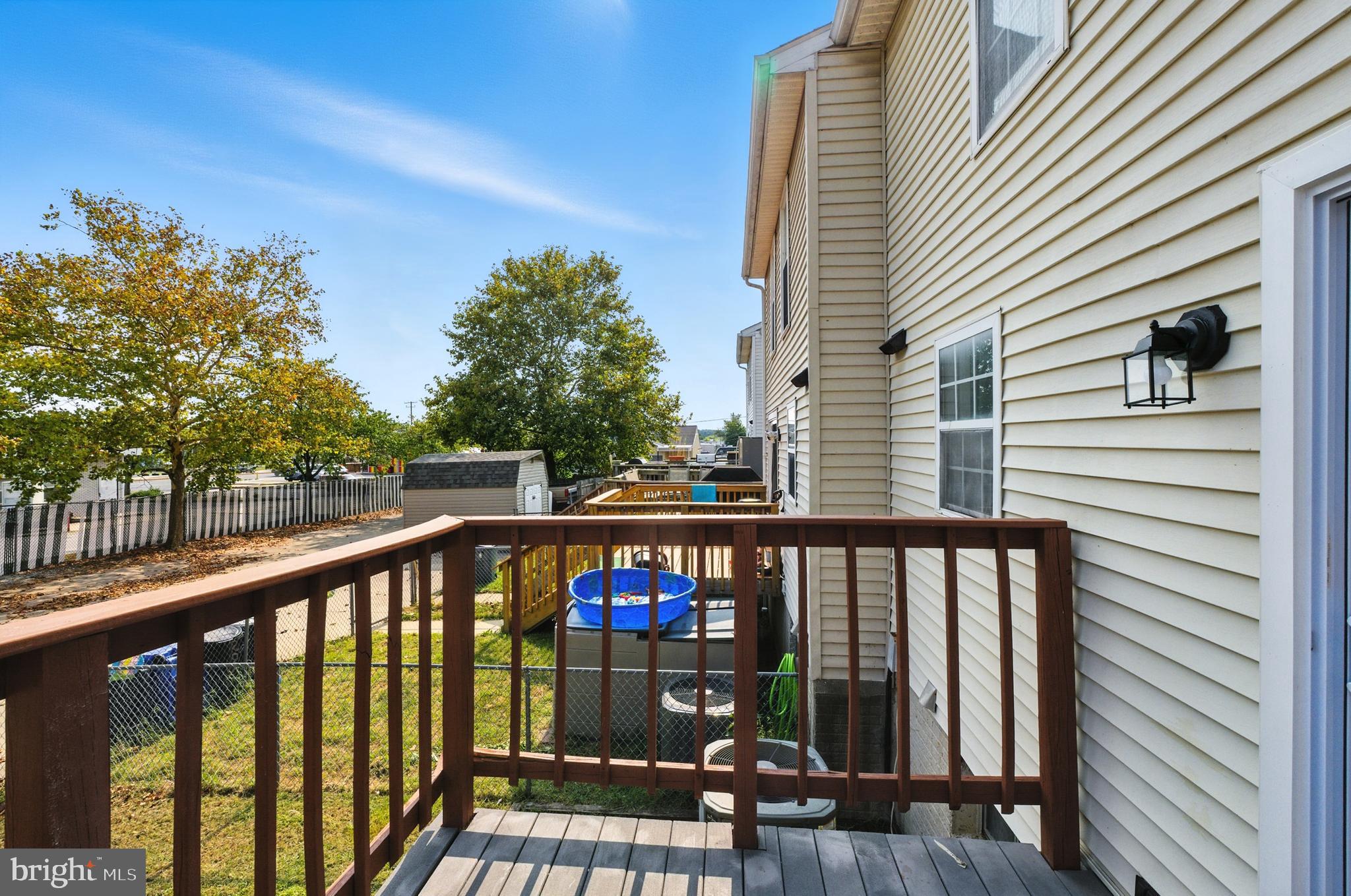209 Magnolia Terrace Baltimore, MD 21221 - Photo 34 of 50 a view of a balcony with wooden floor