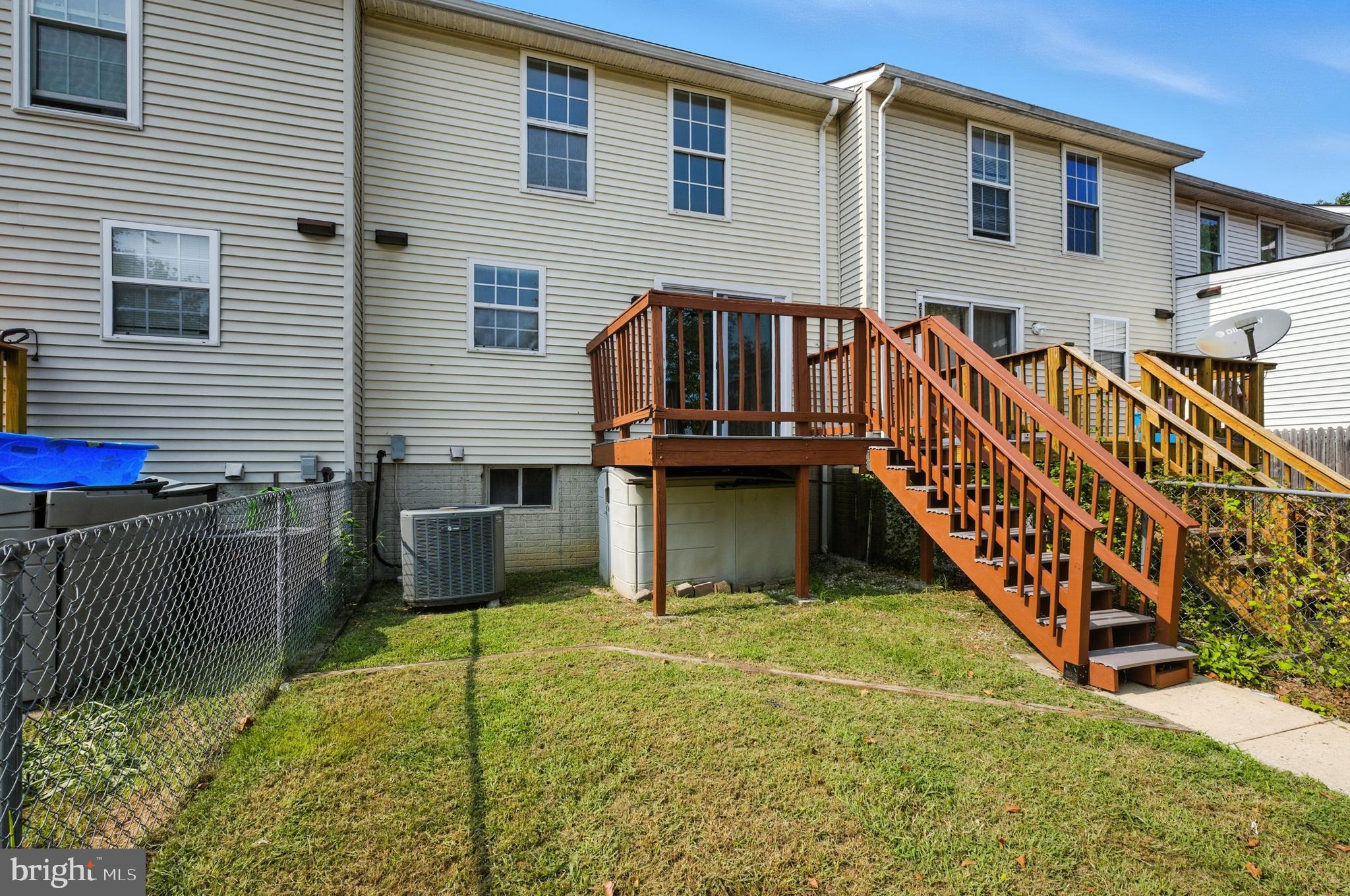 209 Magnolia Terrace Baltimore, MD 21221 - Photo 36 of 50 a view of a house with wooden fence